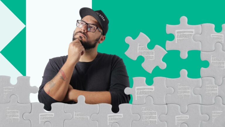 Man stands behind puzzle with snippets of copy on them all wondering how to put a copy strategy together. He holds his chin and looks to the right corner.